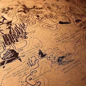 May include: Detailed map illustration with intricate line art on a tan background. Features geographical elements, text labels, and illustrations of landmarks. The map includes text such as "Mo Ce Sea", "Crescent Island", and "The Lion Turtle".