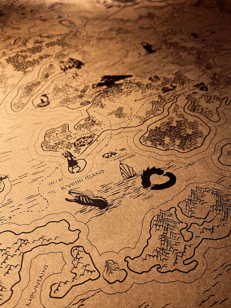 May include: An antique-style map with black line art on a tan background. The map depicts geographical features like mountains, islands, and water bodies. Text labels include "Kyoshi Island" and "Unagi", creating a vintage aesthetic.