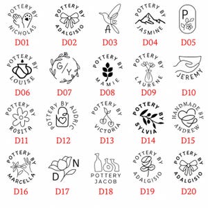 May include: A collection of 20 black and white pottery stamps with various designs, including flowers, bows, and text. Each stamp is circular and features the words "Pottery By" and a name.