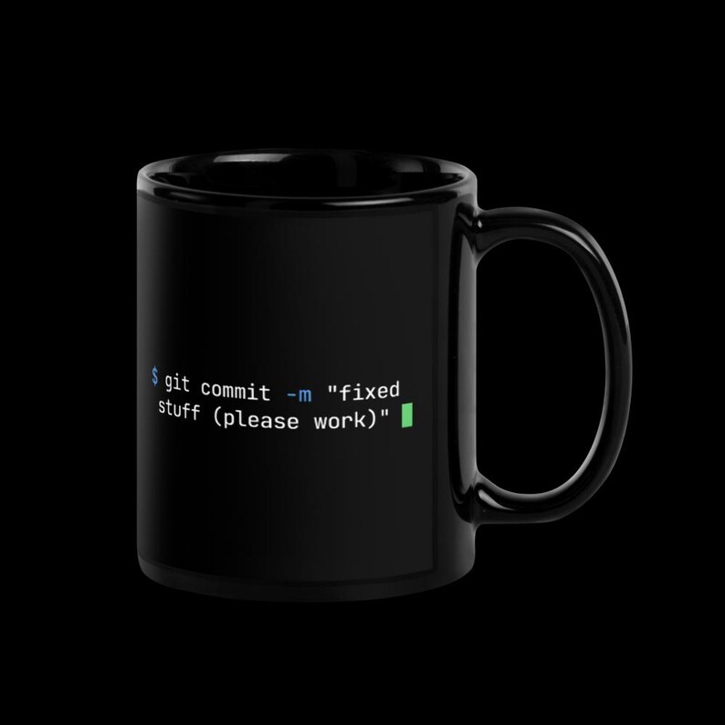 Right handle view of black glossy 11oz coder mug with git commit message — perfect birthday gift for developers and tech professionals.