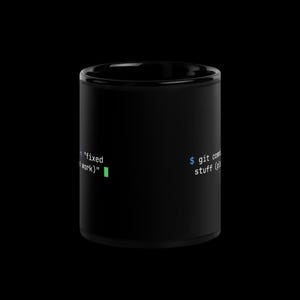 Front view of black glossy 11oz developer mug showing git commit terminal text — funny programmer coffee cup gift.