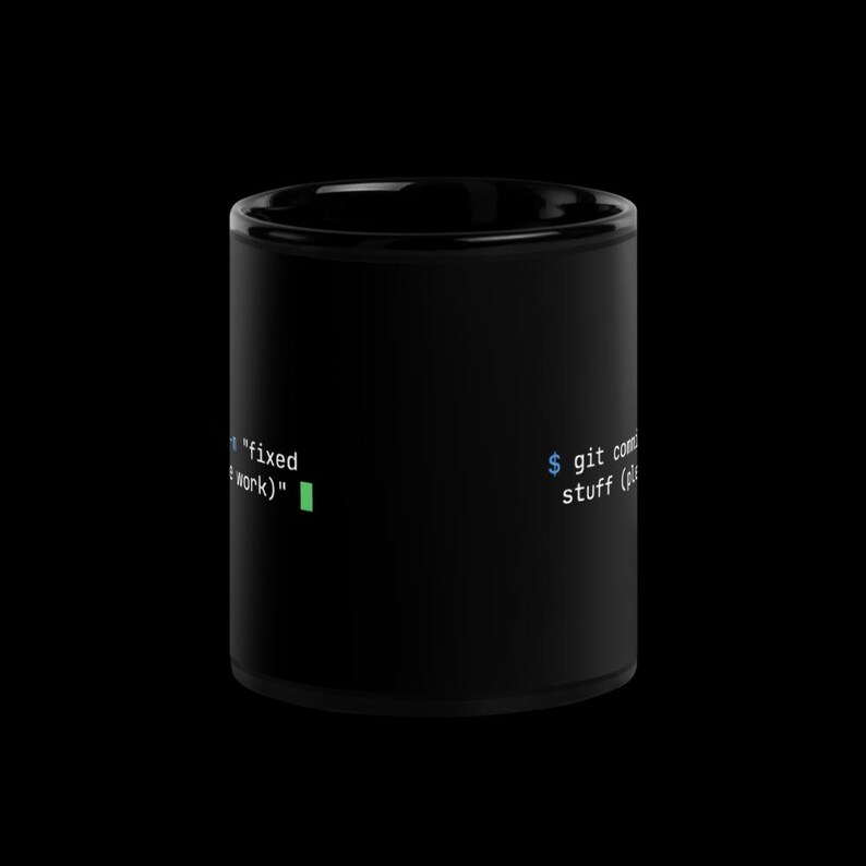Front view of black glossy 11oz developer mug showing git commit terminal text — funny programmer coffee cup gift.