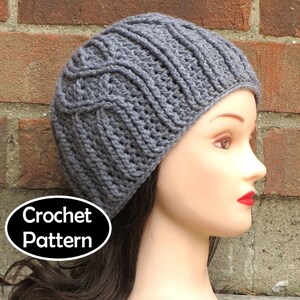 May include: Gray crochet beanie hat with a cable knit pattern. Crochet Pattern.