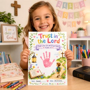 May include: A white paper print featuring the text Trust in the Lord and Proverbs 3:5, decorated with a pink handprint, a lantern, an open book, a path with a child, and a cross. The print includes lines for a name and date, reading Hannah and 08/13/2026.