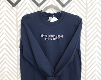 Never Judge A Book By It's Movie Sweatshirt