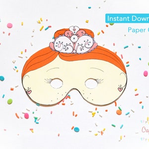 May include: Printable paper craft mask of a girl with orange hair wearing a pink and white crown. The mask has eye holes and a white background.