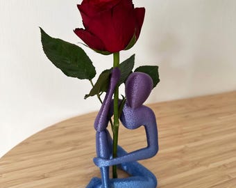 Jarrón con escultura humana minimalista, figura abstracta sosteniendo una flor, decoración moderna para el hogar, arte impreso en 3D.