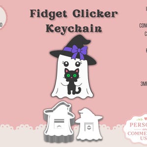 May include: A digital design for a Fidget Clicker Keychain featuring a white ghost wearing a black witch hat with a purple bow, holding a black cat with green eyes. The image includes text labels and two white 3D model views of the ghost shape.