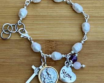 Celebrating Mom: Baroque pearl and gemstone bracelet with two-toned mixed metal holy family and holy spirit medal. Rose quartz amethyst