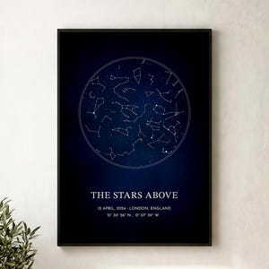 May include: A framed rectangular wall art print featuring a circular star map on a dark blue and black gradient background. The text reads THE STARS ABOVE, 12 APRIL, 2024 - LONDON, ENGLAND, and the coordinates 51 30' 26" N, 0 07' 39" W.