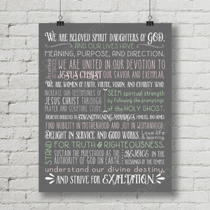 May include: A gray and pink printable wall art print with a quote about women being spirit daughters of God. The quote includes the words "Jesus Christ", "Holy Ghost", "priesthood", "exaltation", and "divine destiny".