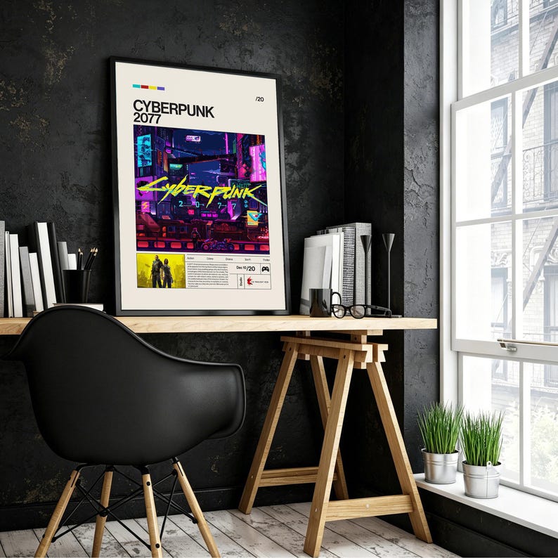 May include: A framed poster featuring the text "CYBERPUNK 2077" in a bold, modern font. The artwork showcases a vibrant, neon-lit cityscape with a futuristic aesthetic. The poster is displayed on a wooden desk with a black chair.