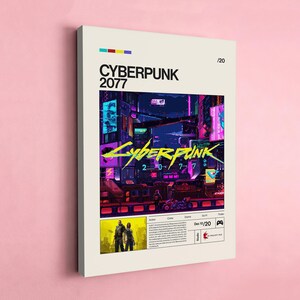 May include: A framed poster with the title "CYBERPUNK 2077" in black text. The poster features a vibrant, futuristic cityscape with neon lights and a yellow and purple logo. The poster includes the date "Dec 10/20".