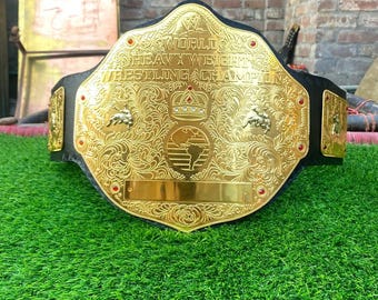 Réplica del cinturón de campeón mundial de peso pesado, de cuero genuino y placas de zinc.