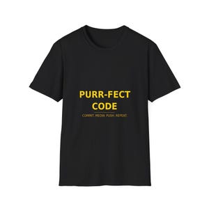 May include: Black t-shirt featuring the words "PURR-FECT CODE" in yellow, with the tagline "COMMIT. MEOW. PUSH. REPEAT." The t-shirt has a crew neck and is likely made of cotton or a similar material.