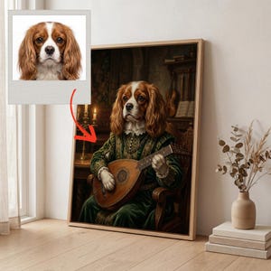 May include: A framed artwork featuring a Cavalier King Charles Spaniel in Renaissance clothing, playing a lute. The dog is wearing a green velvet gown and is seated in a wooden chair. A smaller photo of the dog is in the upper left corner.