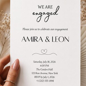 May include: A white engagement announcement card with the words "WE ARE engaged" in elegant script. The card includes the names AMIRA & LEON, event details, and RSVP information. The card is held by a person.