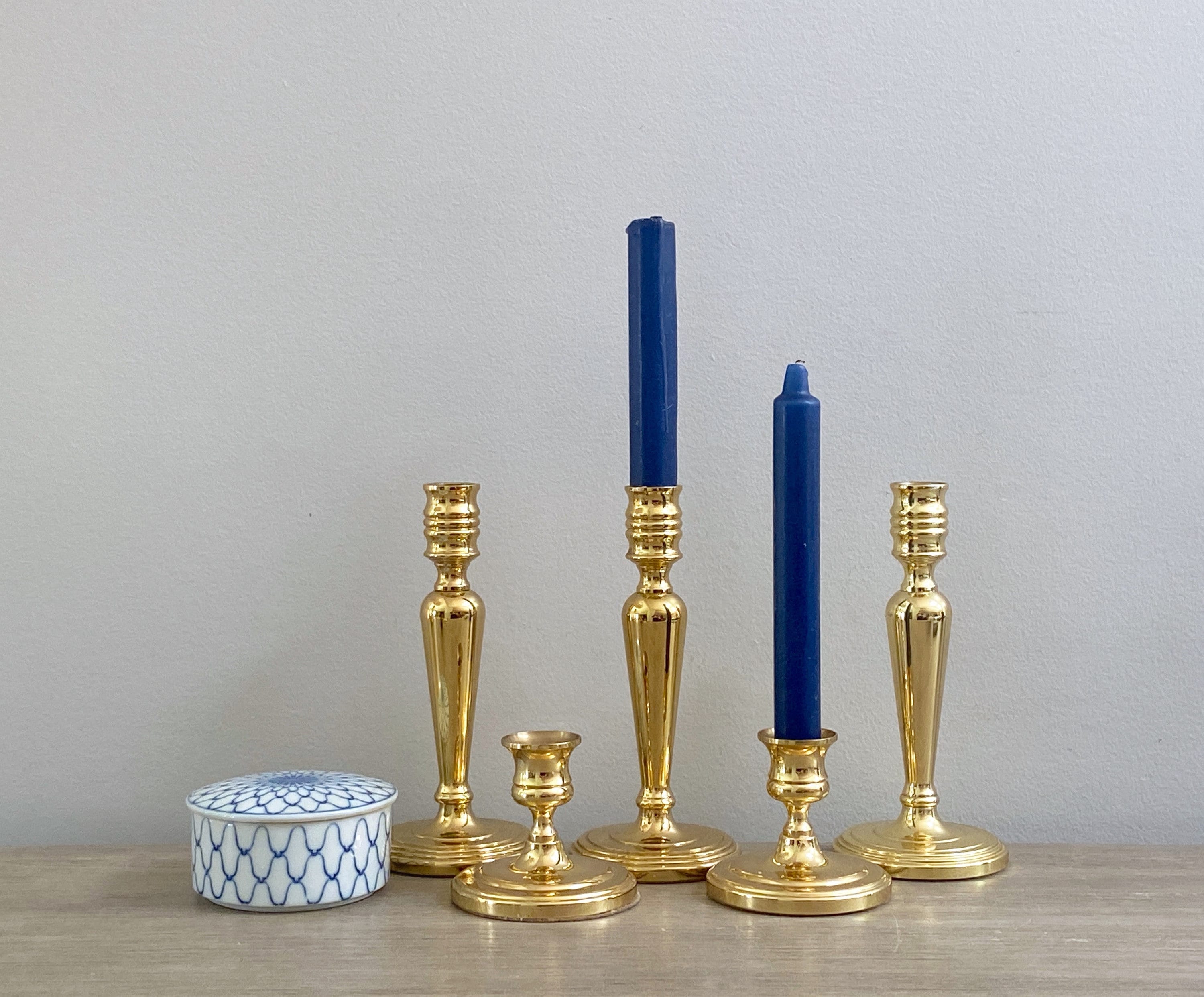 Gorgeous set of five vintage Baldwin brass candlesticks