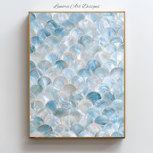 May include: A rectangular wall art print featuring a repeating pattern of overlapping light blue and white iridescent scales. The design creates a shimmering, shell-like texture across the entire surface. The text Lunora Art Designs is visible.