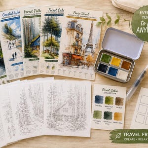 May include: A watercolor painting kit containing five reference guides with scenes like a waterfall and Paris, a metal tin with six paint pans, a water brush, a yellow sponge, a swatch card, and a 50 ml water spritzer bottle with text.