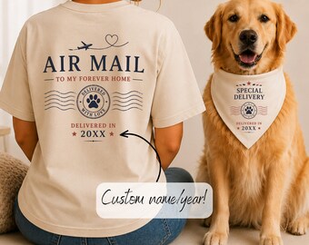 May include: A beige t-shirt and a matching dog bandana, both featuring navy blue and red text and graphics. The designs include an airplane, a heart, wavy lines, a paw print stamp, and the text AIR MAIL TO MY FOREVER HOME and SPECIAL DELIVERY.