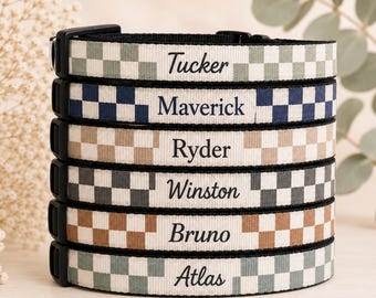 May include: A stack of six dog collars with a checkered pattern in various colors: green, navy blue, tan, gray, brown, and light green. Each collar has a black buckle and is personalized with a dog's name in black text: Tucker, Maverick, Ryder, Winston, Bruno, and Atlas.