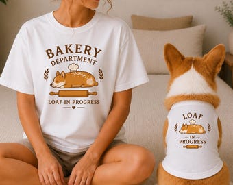 May include: A white t-shirt and a matching white pet tank top, both featuring a brown graphic of a corgi wearing a chef hat, a rolling pin, and the text "BAKERY DEPARTMENT LOAF IN PROGRESS" on the shirt and "LOAF IN PROGRESS" on the pet tank.