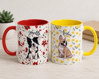 May include: Two ceramic mugs featuring dog illustrations. The left mug has a red handle and interior with a black and white border collie and the name Molly. The right mug has a yellow handle and interior with a fawn French bulldog and the name Archie.