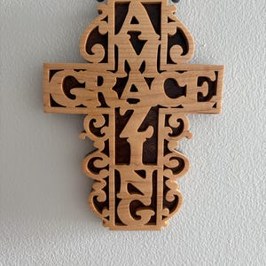 May include: A set of three ceramic mugs with a speckled, matte finish. The mugs are in shades of cream, light gray, and dark gray. Each mug has a simple, minimalist design, perfect for coffee or tea.