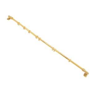 May include: A gold-colored curtain rod with rings and mounting brackets. The rod is straight and has a polished finish. The rings are evenly spaced along the rod, and the brackets are at each end. This hardware is designed for hanging curtains.