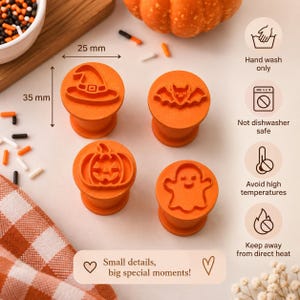 May include: Four orange Halloween-themed cookie stamps featuring a witch hat, bat, jack-o'-lantern, and ghost. Each stamp measures 25 mm by 35 mm. Icons indicate hand wash only, not dishwasher safe, avoid high temperatures, and keep away from direct heat.