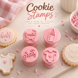 May include: Four light pink circular cookie stamps featuring embossed designs of a baby carriage, a baby bottle, the word baby in script, and a onesie with a heart. The text Cookie Stamps ADD A SPECIAL TOUCH TO YOUR TREATS is visible.