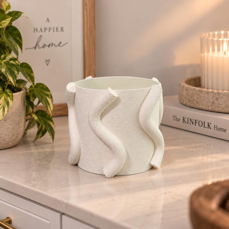 White wavy sculptural 3-wick candle holder