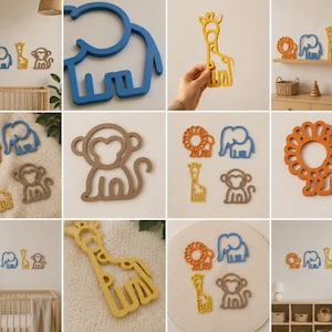 May include: Wooden animal wall art set featuring a lion, elephant, giraffe, and monkey in various colors. The lion is orange, the elephant is blue, the giraffe is yellow, and the monkey is brown. These decorative pieces are suitable for a nursery or children's room.