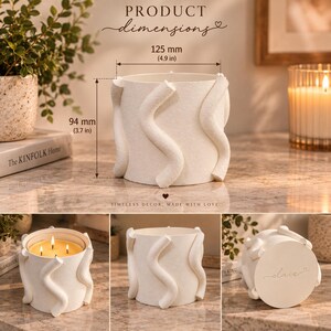 May include: A cylindrical white candle holder with a textured surface featuring raised, wavy vertical lines. The holder measures 4.9 inches in diameter and 3.7 inches in height. The base is marked with the cursive text "daix" and a small heart symbol.