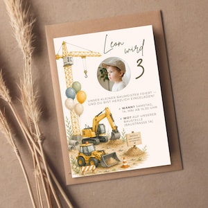 May include: A birthday invitation featuring a watercolor illustration of construction vehicles, including a crane, excavator, and front-end loader. The invitation includes a photo of a child and the text "Leon wird 3". The invitation is on a cream background.