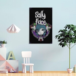 May include: A rectangular black canvas print featuring the text "Sally Face" in white, above a cartoon character with blue hair and a mask. The phrase "Keep Fighting The Darkness" is written around the character in purple.