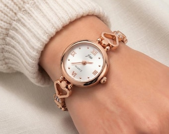 Reloj de cuarzo con diamantes de imitación dorados para mujer, pulsera ajustable con forma de corazón, único.