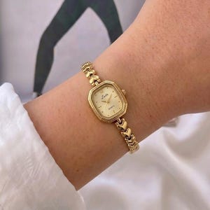 Gold Rectangular Watch Gold Dial Black Leather Strap Quartz