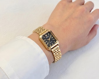 Reloj de pulsera rectangular para mujer, color dorado y negro, esfera pequeña, elegante y a la moda.