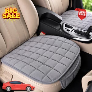 May include: Gray quilted car seat cushion. The cushion is square with rounded corners and a gray border. The image also includes a red car graphic and text that says "BIG SALE" and "BEST PRICE".
