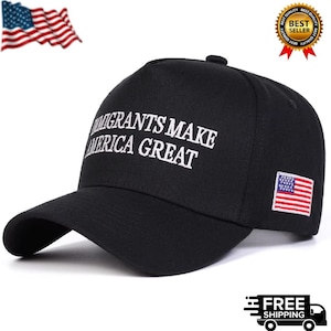 May include: Black baseball cap with the embroidered text "Immigrants Make America Great" in white. Features a small American flag patch on the side. A waving American flag is in the upper left corner.