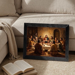 May include: A framed wall art print depicting the Last Supper, featuring Jesus seated at a table with twelve disciples in a dimly lit room. The scene is rendered in warm, golden tones with figures wearing robes, gathered around a table with bread.