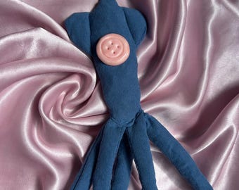 Porte-clés en peluche calmar avec oeillet rose