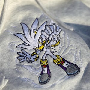 Embroidered Silver Hedgehog Hoodie, Sweatshirt, & Tee