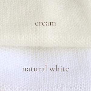 May include: A close-up view of two distinct fabric swatches with a fine, open-knit texture. The top section is labeled cream, and the bottom section is labeled natural white. Both fabrics feature a soft, semi-sheer appearance with a consistent mesh pattern.