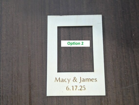 Close-up example of font choice two engraved on a personalized birch mini photo frame magnet.