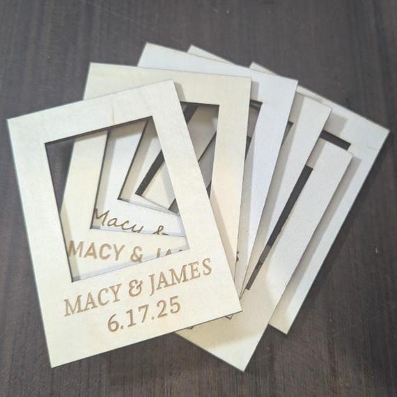 Several personalized Baltic birch mini photo frame magnets arranged together to show the front details.
