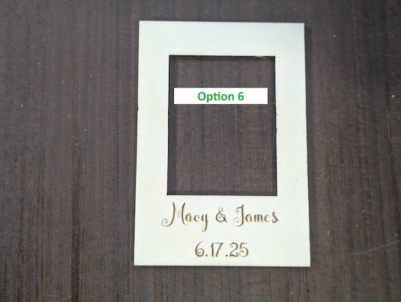 Close-up example of font choice six engraved on a personalized birch mini photo frame magnet.