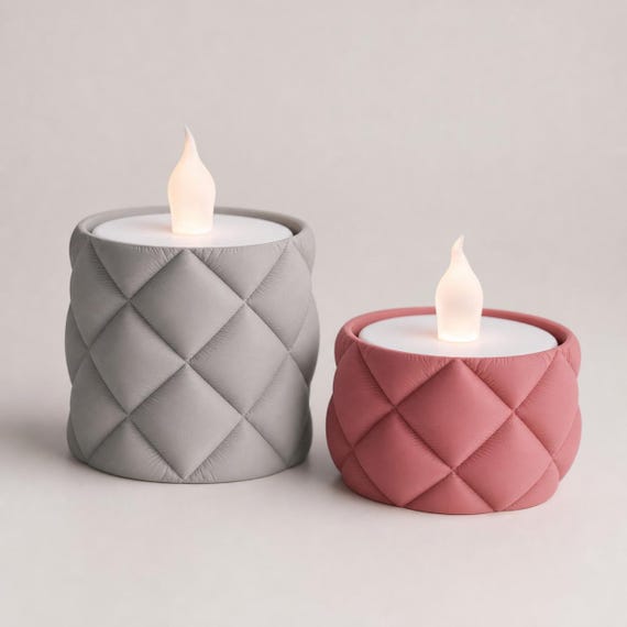 Ash Gray tall and Sakura Pink low VowLoom quilted LED tealight holders in a close-up studio view